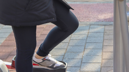 Winter health care. legs running on a sports equipmentの写真素材