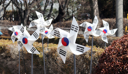 The pinwheel national flag in the park.の写真素材
