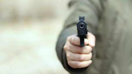 Close-up image of the muzzle of a gun.の写真素材