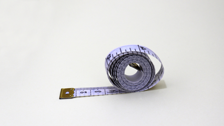 Tape measure on white background.