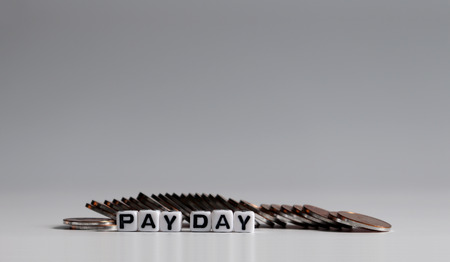 The coins and white cube with 'PAYDAY' letters.