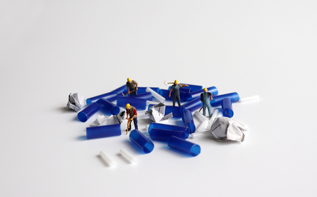 Concept of difficulty in disposing of used and discarded plastic products.の写真素材