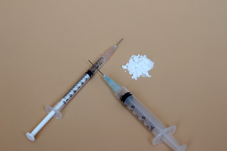 Two disposable syringes and drugs.の写真素材