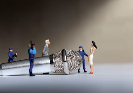 Miniature people. The concept of social discrimination.の写真素材