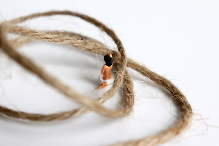 Miniature woman. The concept of sexual violence.の写真素材
