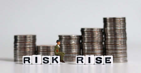 White cube bearing the word 'RISK' and word' RISE'.の写真素材