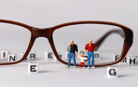 Business concept with glasses and miniature people. Concept about 'love is love'.の写真素材