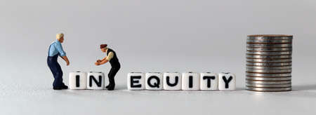 White cube with the word 'EQUITY'. Two miniature men and white cube with an 'IN'. The concept of...