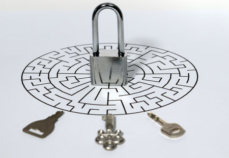 Keys and locks in the maze. Security keys used as background security systems, hacking, and business concepts. Padlock set to open with different keys.の写真素材