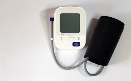 Blood pressure monitor medical diagnostic device. Digital blood pressure monitoring device on a...