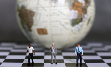 Businessmen standing against the backdrop of the globe. Global business concept.の写真素材