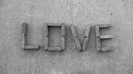 A brick letter of love on the ground . with black&white tone , center of the picture.の写真素材