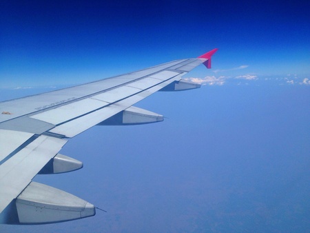View out of airplane Airplane wing in flight