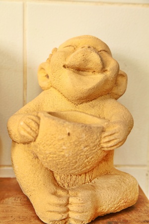 Statue of a monkey playing musicのeditorial素材