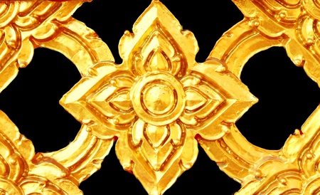 Thai gold on the walls of the templeの写真素材