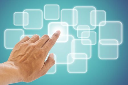 hand pushing a button on a touch screen interface