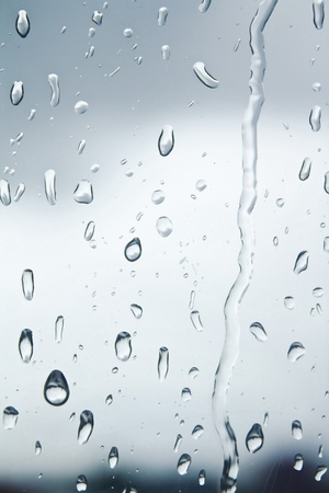 water drops in the rain on the windowの写真素材