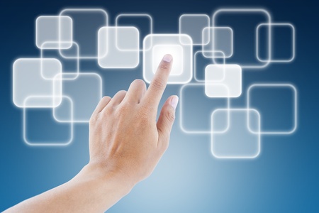 hand pushing a button on a touch screen interface 