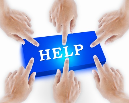 hand pushing a help button on a touch screen interfaceの写真素材