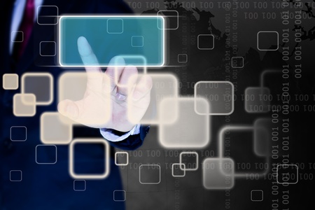 hand of business man pushing a button on a touch screen interfaceの写真素材