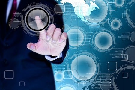 hand of business man pushing a button on a touch screen interface 
の写真素材