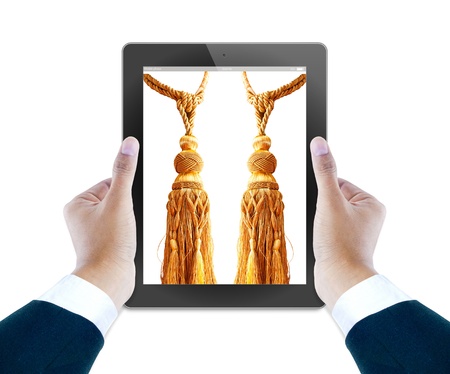 hand of business man holding and touching on touch pad の写真素材