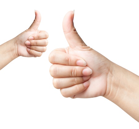 Hand of women giving like on background white の写真素材