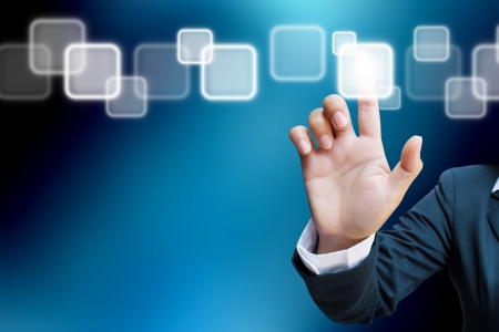  hand of business women pushing a button on a touch screen interface の写真素材