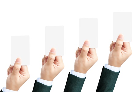 Hand of business women holding blank paper label or tag on white background の写真素材