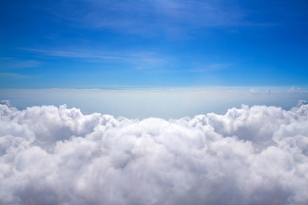 Clouds and sky blue, Viewed from an airplane windowの写真素材