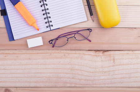 Open notebook, Free space for text. glasses On the desk. Top view. in Officeの写真素材