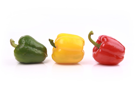 Colorful sweet peppers isolated on white background.の写真素材