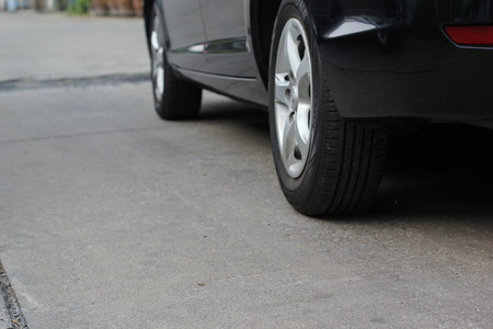 still wheel car with ground roadの写真素材