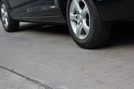 still wheel car with ground roadの写真素材