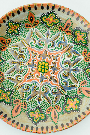 Close up of vintage  dish with traditional oriental ornamentの写真素材