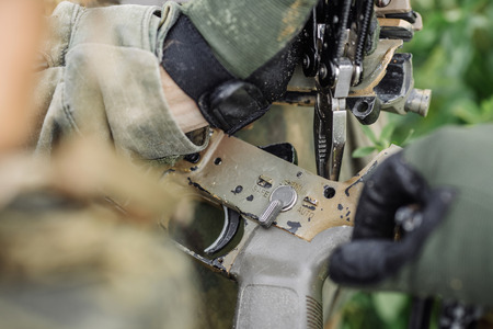 ranger repair fix the rifle with the tool in the battlefieldの写真素材