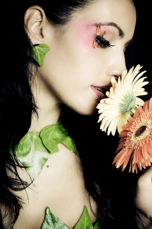 Portrait of woman with leaves necklace  Profesional and artistic make upの写真素材
