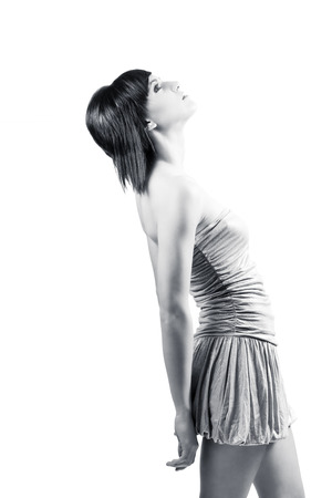 Woman with silver dress in black and whiteの写真素材