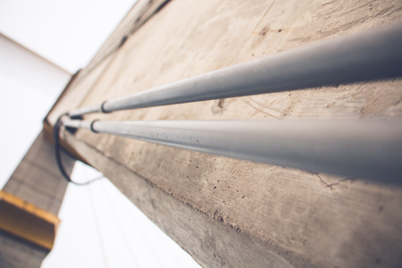 Steel pipe with Rama VIII Bridge at Bangkok Thailandの写真素材