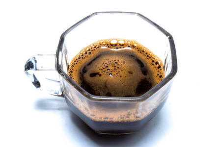 coffee in glass cup, isolated on white background の写真素材
