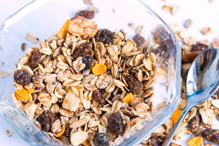 Granola cereal with raisins and nutsの写真素材