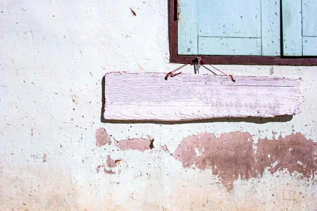 Pink wooden sigh on old cement wallの写真素材