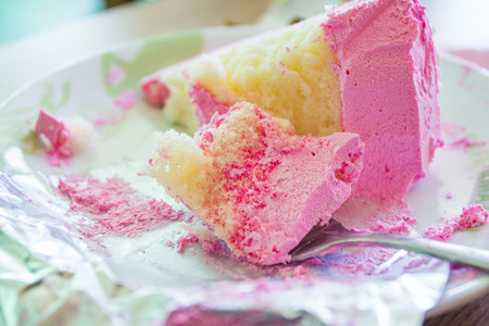 Pink cake has been eatenの写真素材