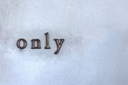 The word only on a cement wall