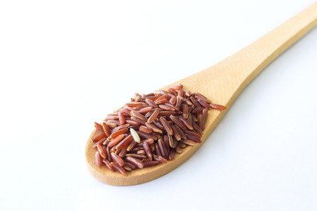 Organic Riceberry Rice (black jasmine rice) isolated on whiteの写真素材