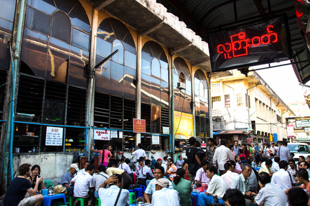 RANGOON, MYANMAR - DEC16, 2012: The Burmese people drinking coffee in the market.のeditorial素材