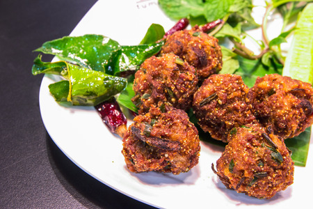 Fried spicy minced pork (Thai food name larb tord)の写真素材