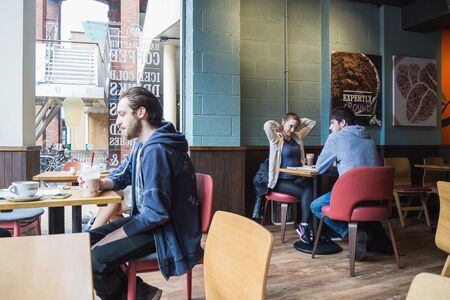 SHEFFIELD, UK - JUN07, 2017: People drinking in Costa coffee shop for relaxing.