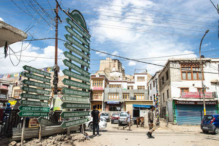 LEH, LADAKH, INDIA - JUN15, 2018: Busy street at Leh city: shops, goods and people on the street, Ladakh, Indiaのeditorial素材