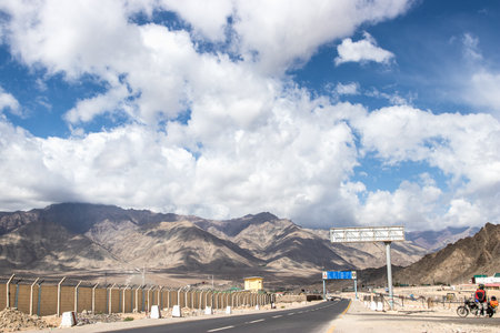 LEH, INDIA - JUN16, 2019: Landscape view of rural road on Leh highway with mountain and sky background in Leh - Ladakh northern of Indiaのeditorial素材